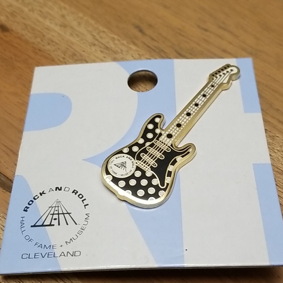Guitar pin from the Rock-n-Roll Hall of fame in Cl
